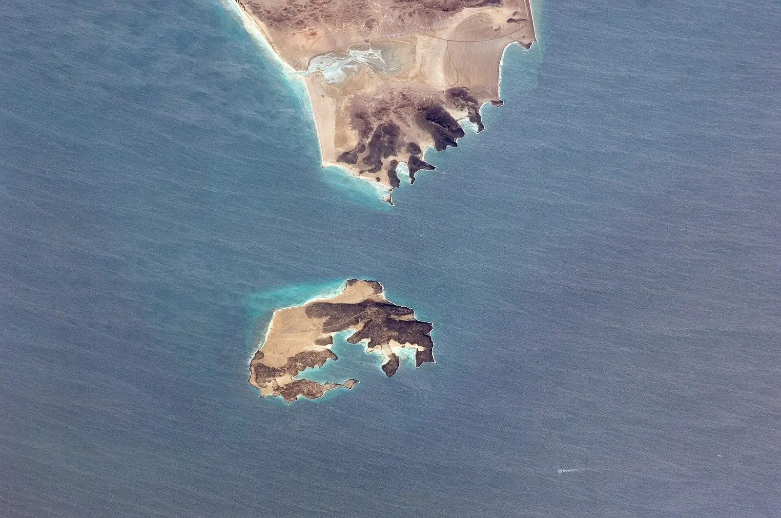Mayyun (Perim) Island and the Shaikh Said Peninsula in the Bab el-Mandeb Strait seen from space