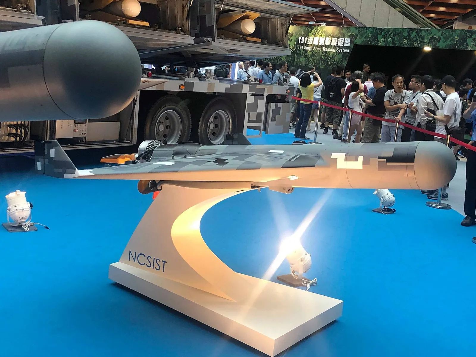 Taiwan NCSIST's Chien Hsiang loitering-munition drone displayed on a stand in an exhibition hall
